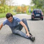 Hit,And,Run,Concept.,Injured,Man,On,Road,In,Front